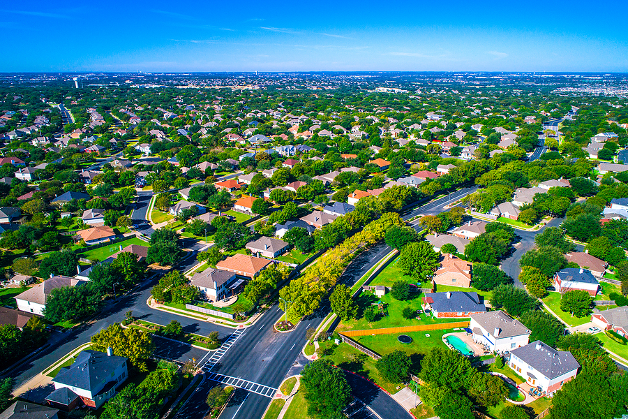 Hundreds Of Homes Line The Curved Modern Roads Of The New Suburb